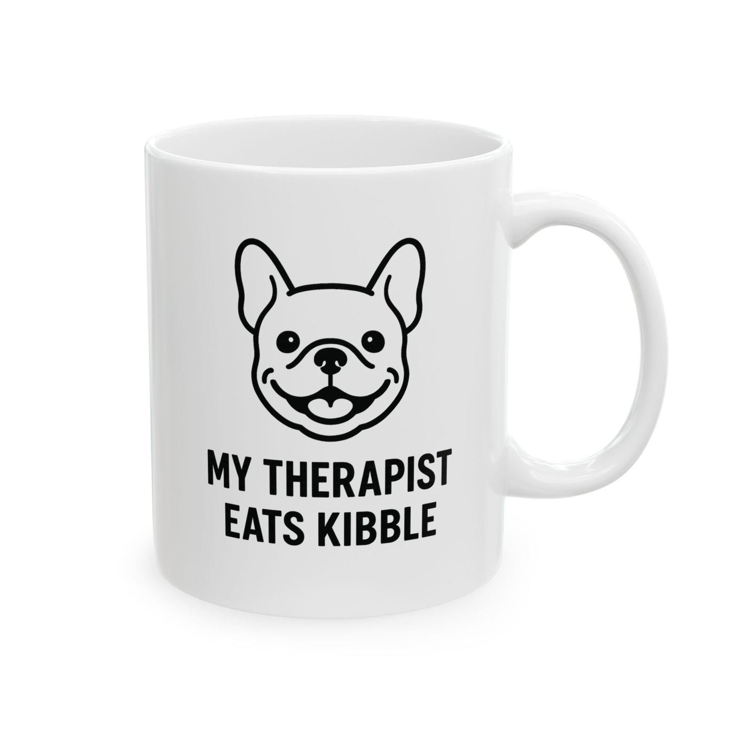 White mug with a dog illustration and text 'My Therapist Eats Kibble' on a white background