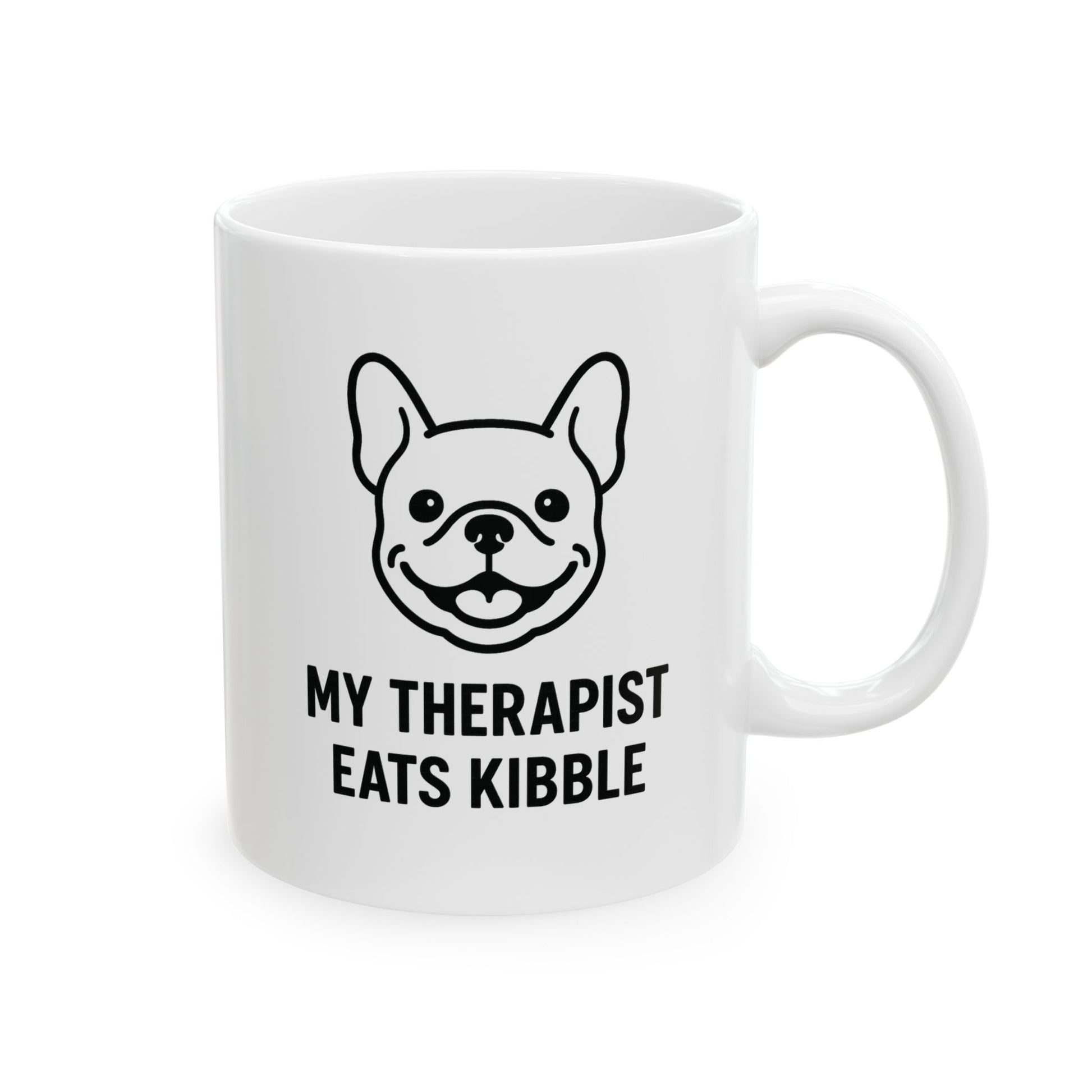 White mug with a dog illustration and text 'My Therapist Eats Kibble' on a white background