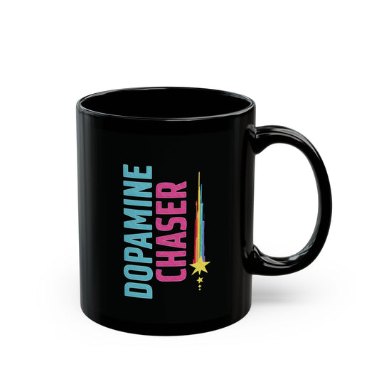 Black mug with 'Dopamine Chaser' text and colorful design on a white background